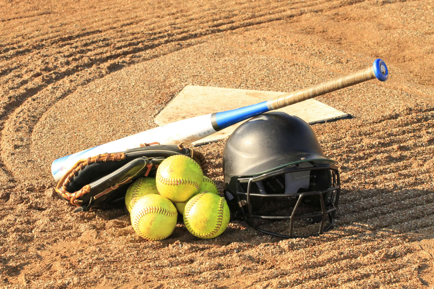 Pile of Softball equipment