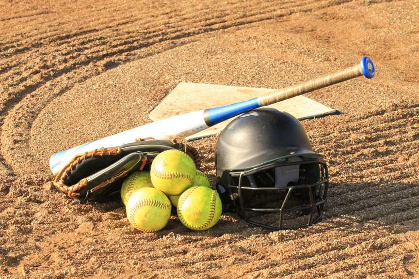 Pile of Softball equipment